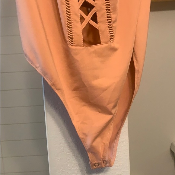 Orangish cream onesie - Picture 3 of 4